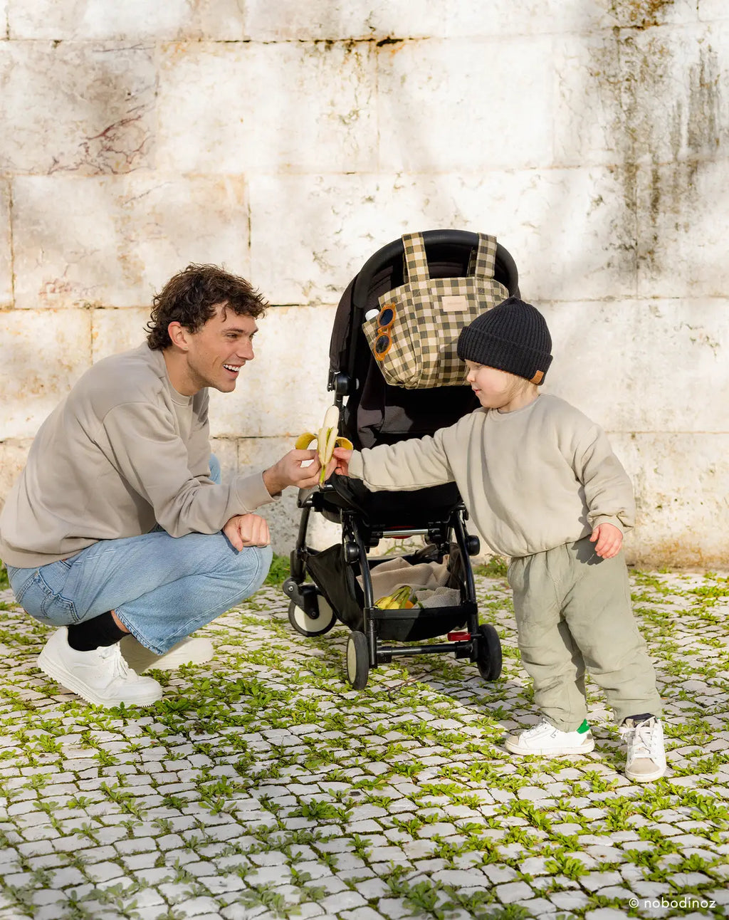 Father and son with Hyde Park Stroller Organizer in the background