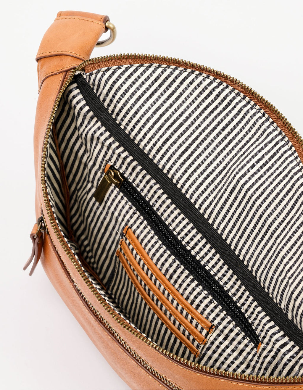 Inside liner of brown soft grain leather bum bag
