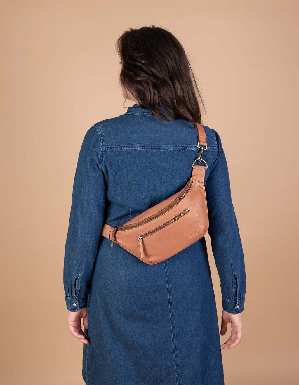 Woman wearing soft grain leather bum bag