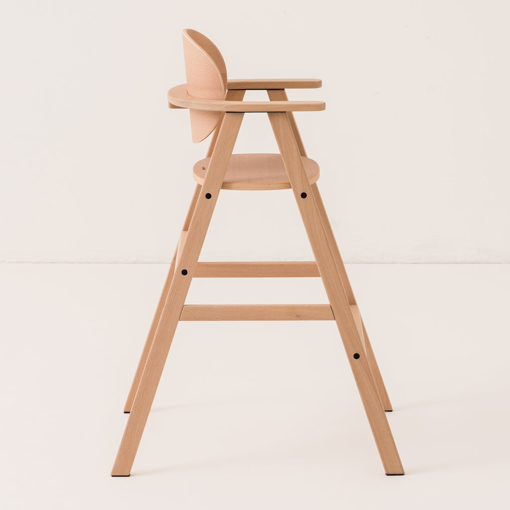 A profile shot the wooden evolving high chair
