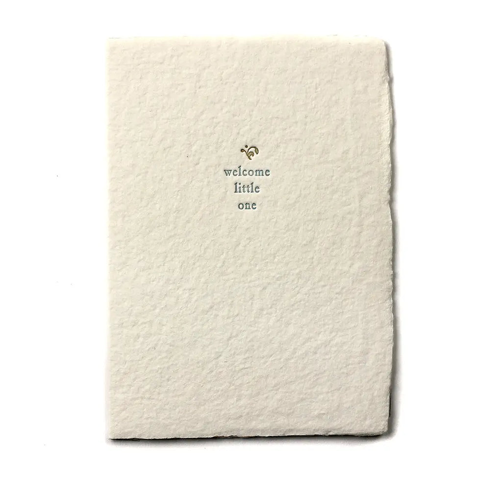 handmade paper cards with soy ink letterpress on recycled cotton paper that reads "welcome little one."