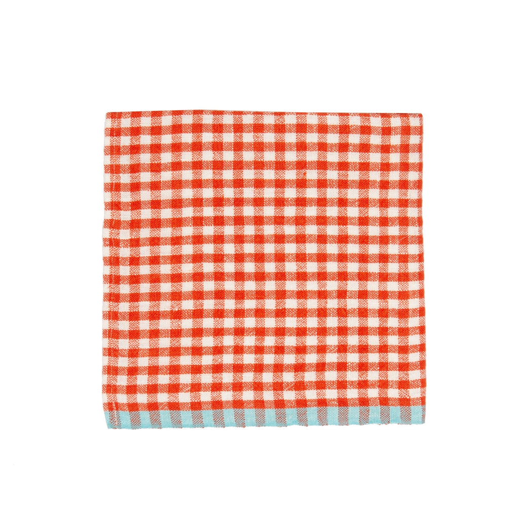 Red and white checkered napkin on a white background