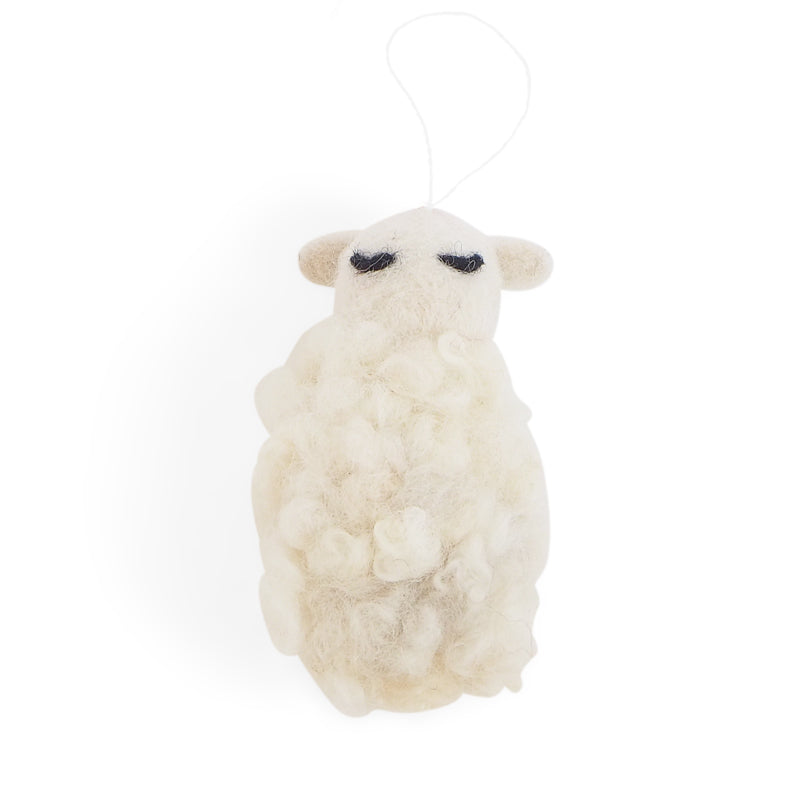 White fluffy sheep ornament on a white background