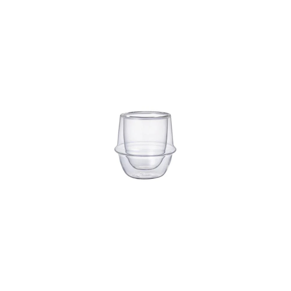 Glass espresso cup on a white background
