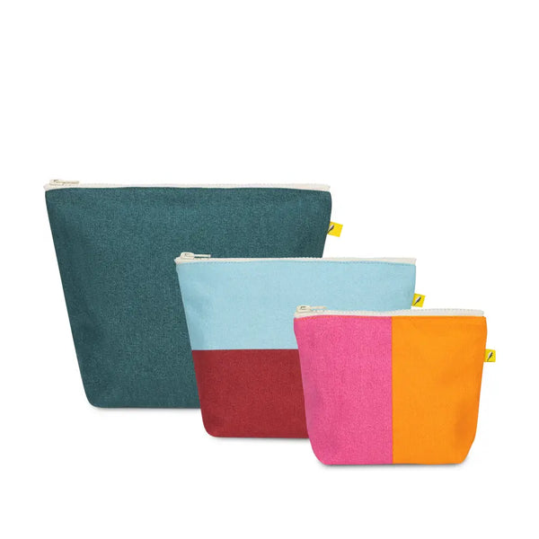 Three colorful pouches with zipper closures on a white background