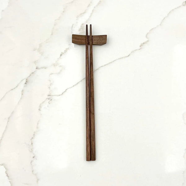 Wooden chopsticks on a marble surface