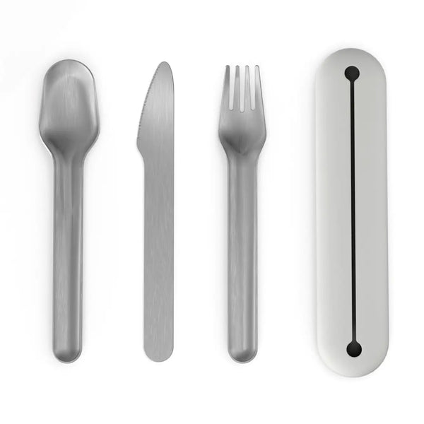 Set of silver cutlery including spoon, knife, and fork on a white background