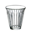 Clear glass tumbler with vertical ridges on a white background
