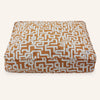 Dog bed with geometric pattern on a white background