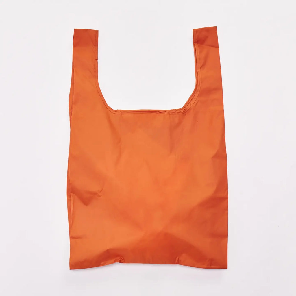 An orange reusable shopping bag with a wide top opening, shown flat against a plain white background.