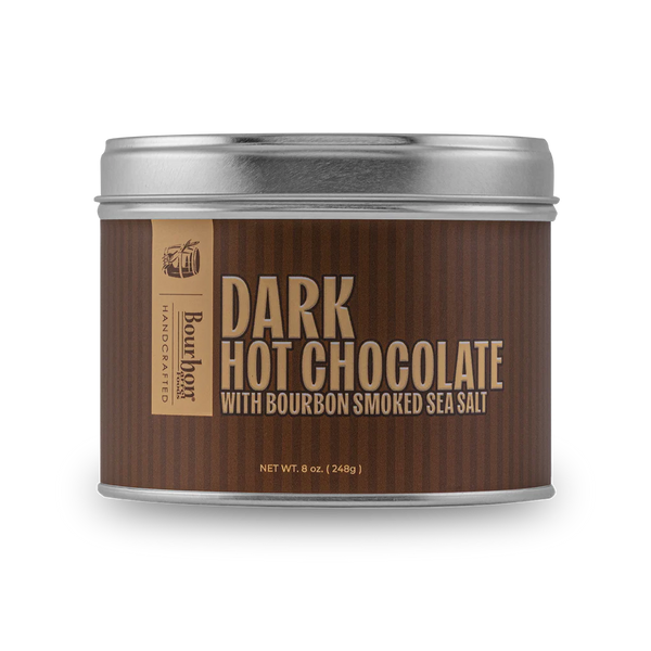 Tin of dark hot chocolate with bourbon smoked sea salt on a white background