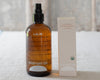 Brown bottle and white box of 'Everyday Oil' by Baseline on a light background