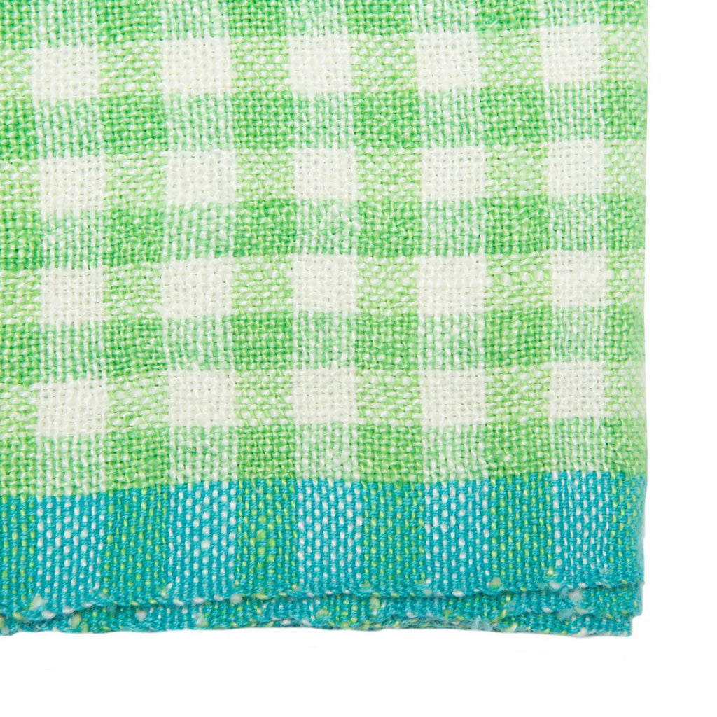 A close-up of a woven textile with a green and white gingham check pattern and a turquoise blue border along the bottom edge.