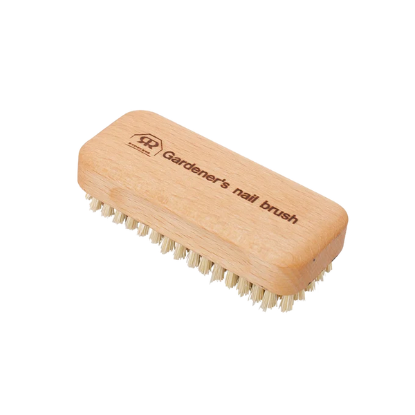 A wooden gardener's nail brush with light natural wood handle and cream-colored bristles, shown on a plain white background. The handle is engraved with the brand logo and the text 'Gardener's nail brush'.