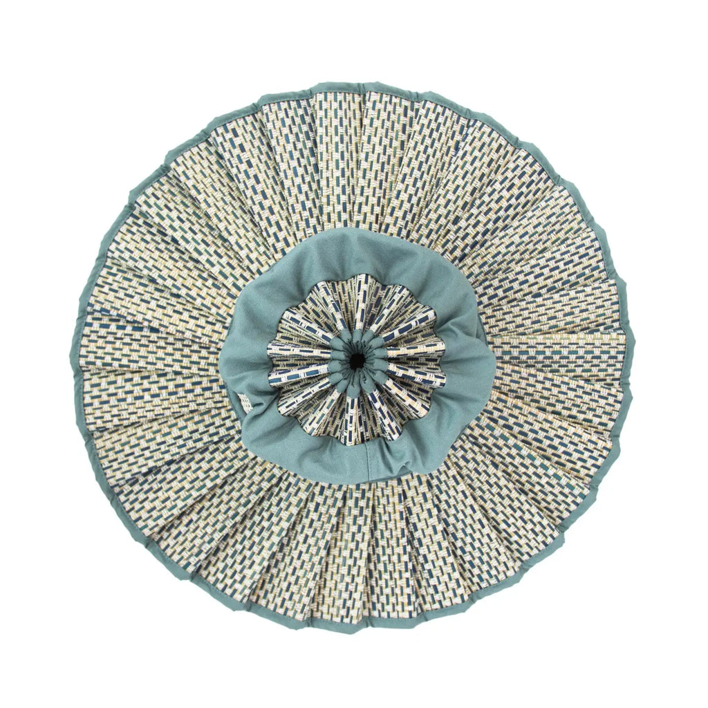 Round woven hat on a white background