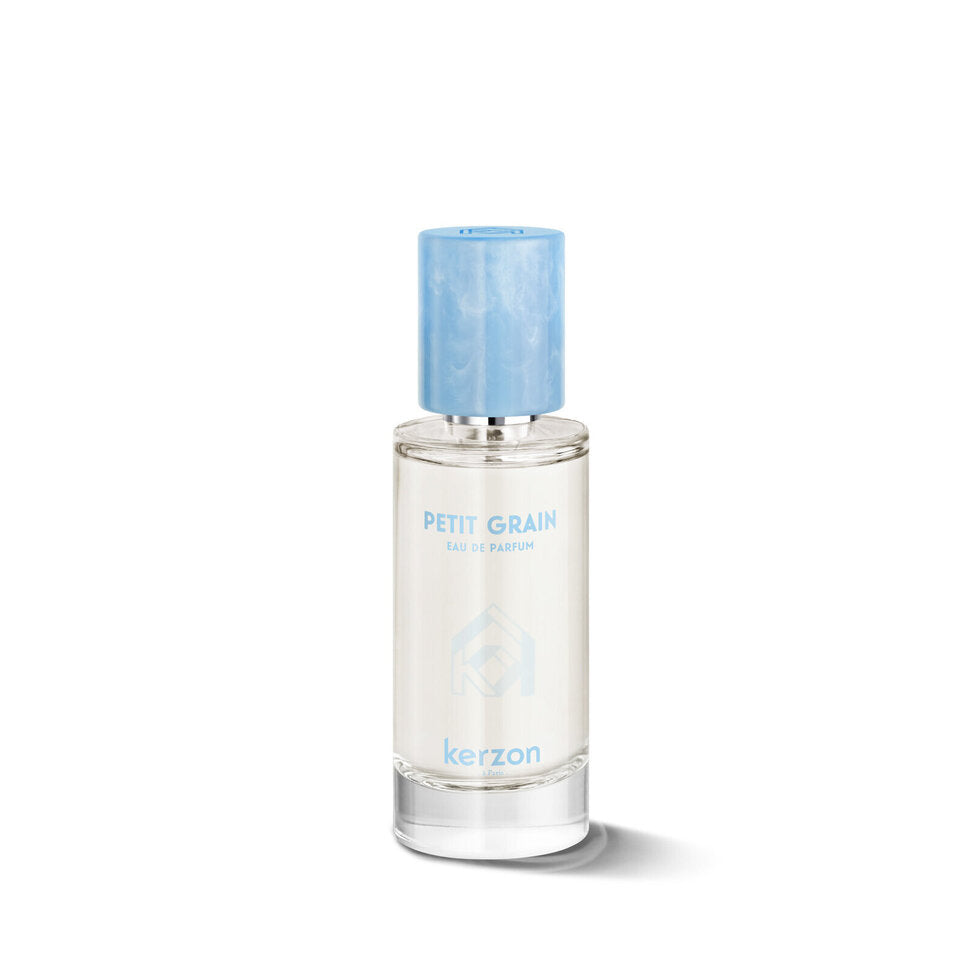 Perfume bottle labeled 'Petit Grain' by Kerzon on a white background