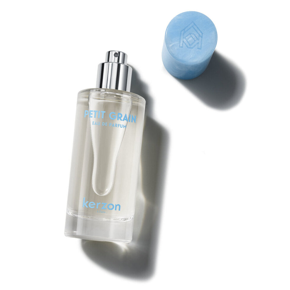 Kergon Petit Grain perfume bottle with blue cap on a white background