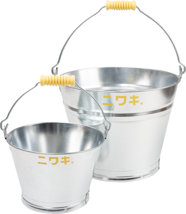 Two different sized metallic buckets with yellow handles