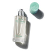 Perfume bottle with cap on a white background