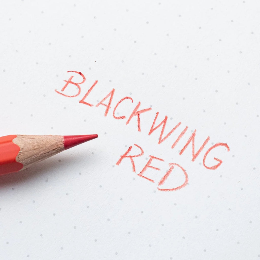 Red pencil with 'Blackwing Red' text on a white background