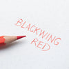 Red pencil with 'Blackwing Red' text on a white background