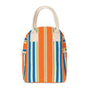 A striped canvas lunch bag with vertical orange, blue, green, and white stripes, featuring cream-colored fabric handles and side pockets.