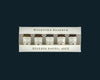 Woodford Reserve bourbon barrel aged bitters set on a black background